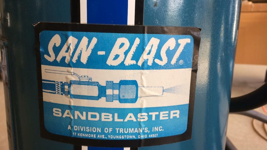 A Sanblast sandblaster Model 102594 with hose & moisture trap.
