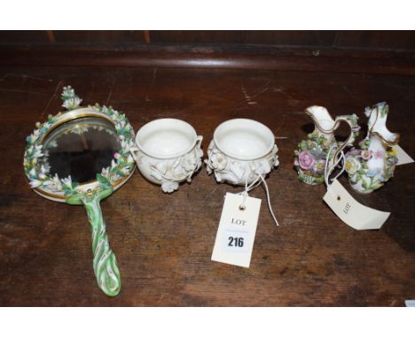 A pair of Derby Stevenson & Hancock white ware cauldrons, with applied naturalistic flowers, height 5.5cm, crown above SH fla