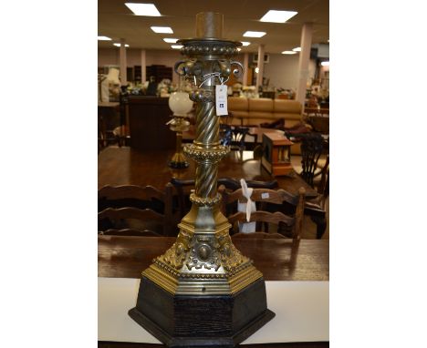 A 19th Century brass ecclesiastical candlestick converted to electricity (needs re-wiring).