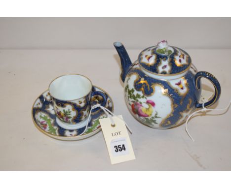 A Worcester style teapot, tea cup and saucer, by Samson, decorated with insects and birds.