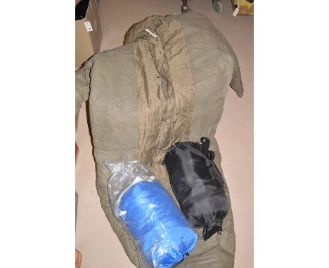 Two sleeping bags; and another; together with a stab-proof waist coat.