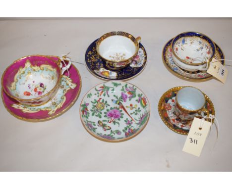 A Famille Rose dish decorated with birds, flowers and butterflys; a Copeland Spode teacup and saucer with gilding, pattern No