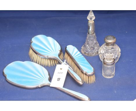 A silver and blue guilloche enamel dressing table set, Birmingham, comprising: a hand mirror, hairbrush and clothes brush; to