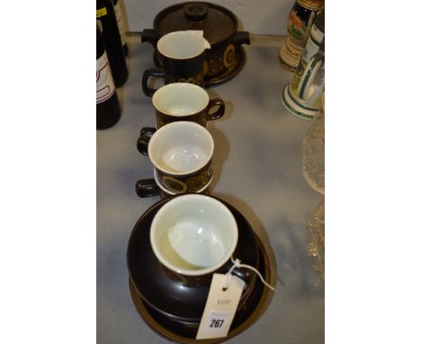 Denby 'Arabesque' pattern part tea set, comprising: five cups and saucers, four plates, a jug, a tureen, and a plate.