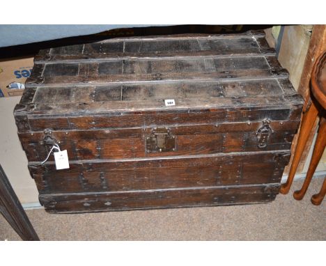 A metal-bound dark stained wooden trunk, 76cms wide.