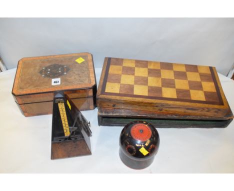 A 19th Century walnut sewing box, crossbanded with rosewood and brass and mother-or-pearl inlay; a rosewood metronome (cover 