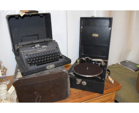 A Universal Underwood typewriter; a Triumph gramophone; and a portable sewing machine in Waterloo case.