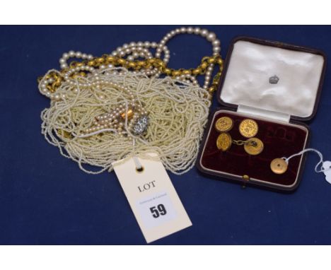 A pair of yellow metal cufflinks and costume necklaces, to include: faux pearls; and others.