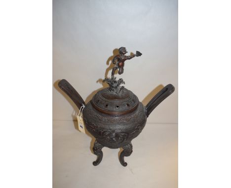 A large Japanese bronze Koro and cover in the manner of Shokaken, the ogee shaped body cast with two phoenix flanked by cloud
