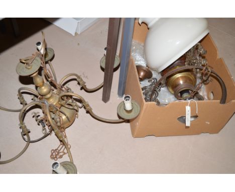 A modern Victorian style ceiling hanging electric light fitting in the form of an oil lamp with opaque shade; and another mid