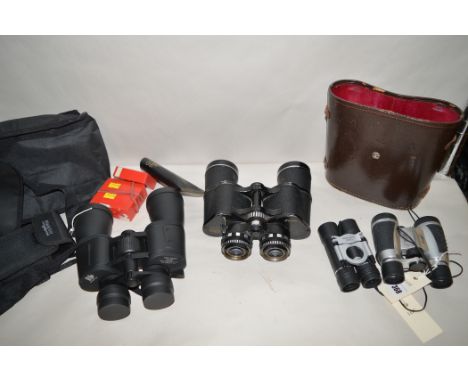 Binoculars by First 2, Blackfoot; Hanoptik and Raiya Uniscope, in various cases.