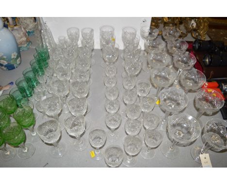 A cut glass decanter; a quantity of cut and coloured glassware.