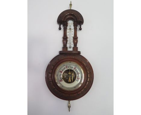A pretty Victorian walnut carved barometer with thermometer, height 43cm 