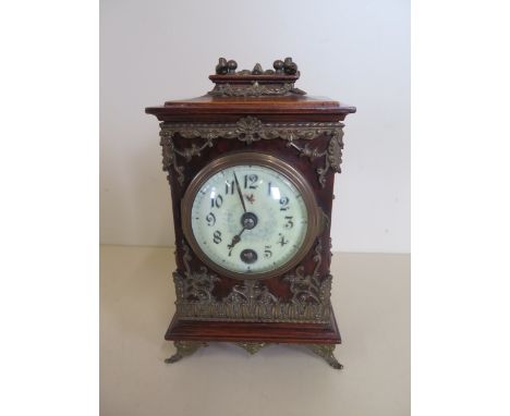An ormulu mounted Leuzkirch carriage type mantle clock, 18cm tall, in good condition, working 