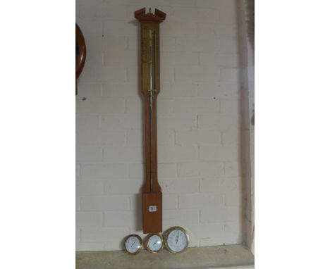 A Varo Coricelli barometer, with brass barometer, a hygrowmeter and a thermometer 