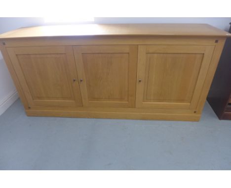 A Multi-York light oak three door sideboard, as new - 200cm W x 90cm H 
