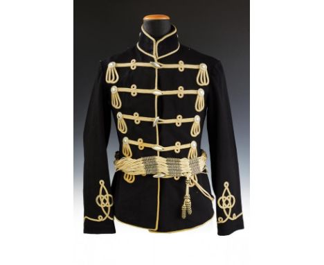 dating: about 1910 provenance: Prussia, In black cloth with white rope-making and silver-color buttons. A button on the colla