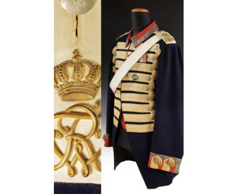 dating: circa 1900 provenance: Prussia, In blue cloth with red collar and sleeves and NC-officer stripe. White shoulder board