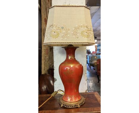 TABLE LAMP, 46cm H including shade 78cm H sang de boeuf with gilt detail on gilt metal base. 