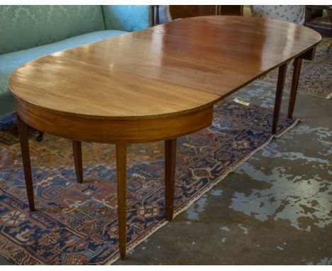 DINING TABLE, D end top with three extra leaves overall 231cm L extended by 107cm W x 73cm H, George III and later mahogany. 