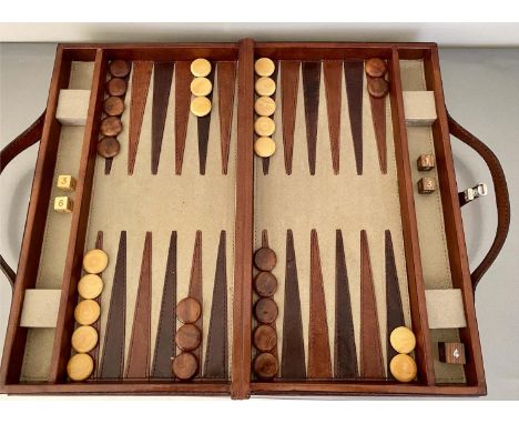 BACKGAMMON SET, leathered case, 7cm x 23cm x 40cm, contemporary. 