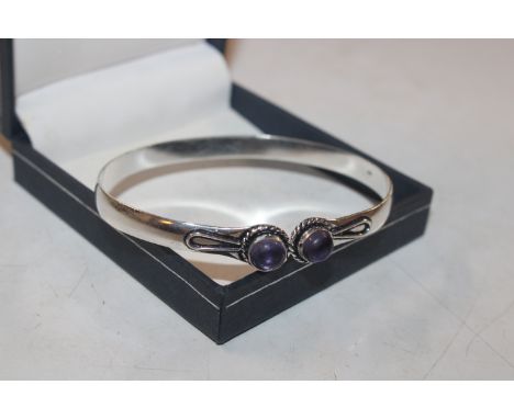 A 925 silver and amethyst set bangle
