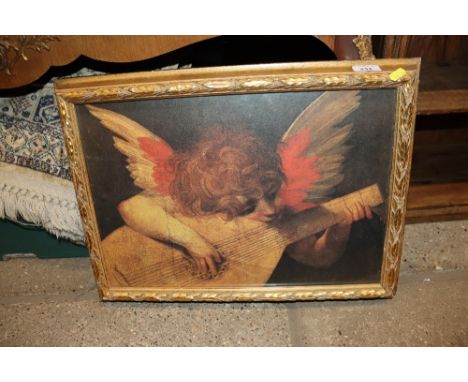 A gilt framed print depicting winged cherub playing a lute