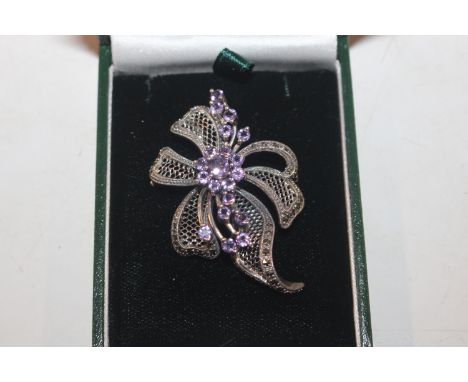A Sterling silver and amethyst set brooch approx. 13.5gms 