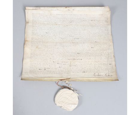 A Charles II indenture manuscript, hand written with ornate title piece, on two sheets of vellum, each measuring, 68.5cm x 60