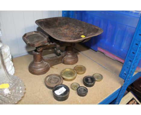 A set of balance scales and weights 
