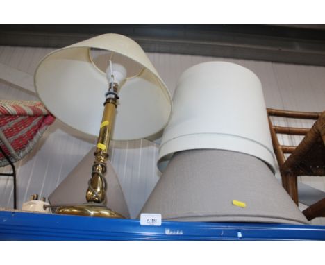 A brass table lamp and shade, and a quantity of lamp shades 