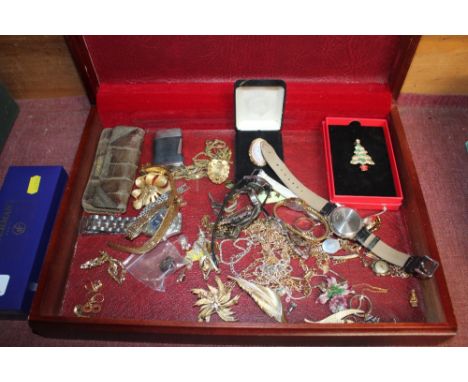 A case of various costume jewellery to include wrist watches, lighter, yellow metal ear-rings etc.