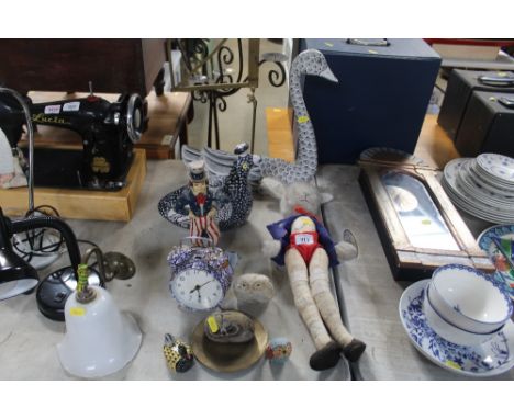 A quantity of ornaments, an alarm clock, soft toy in the form of a rabbit