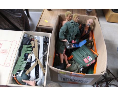 A box containing vintage Action Men etc