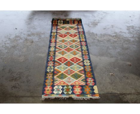 An approx 6'8" x 2'1" Chobe Kilim runner