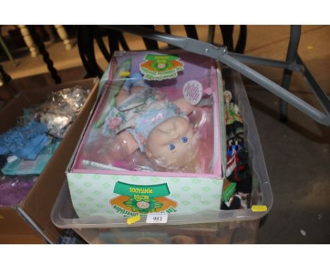 A box of children's toys and souvenir dolls to include a Cabbage Patch Kid