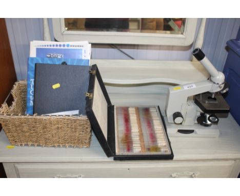 A Brunel microscope with slides and instruction manual