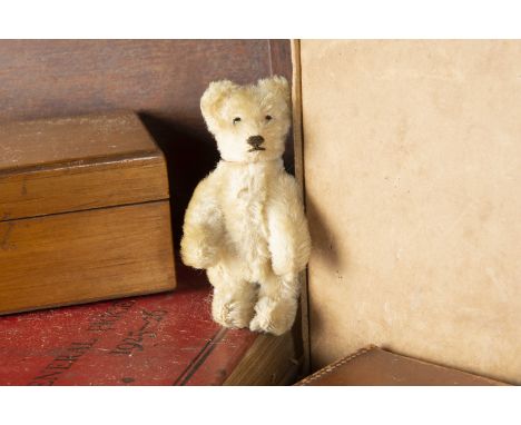 Irvin - a post-war miniature Steiff Teddy Bear, with white mohair, black pin eyes, brown stitched nose and mouth, swivel head