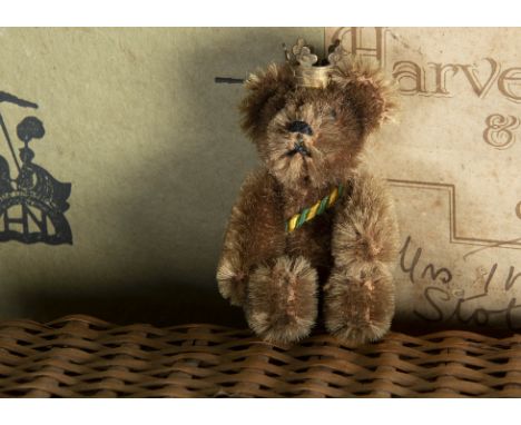 A rare post-war Schuco miniature British Petroleum's (BP) TeddyBear, with brown mohair, black pin eyes, black stitched nose a