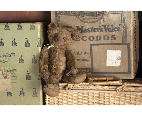 Benjamin Brown - an early British Teddy Bear, with brown mohair, black boot button eyes, pronounced small muzzle, replaced bl