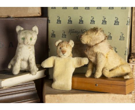 A Steiff 1930s five-way jointed lion, with golden mohair, brown tipped mohair mane, clear and black glass eye with brown back