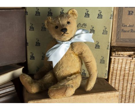 Downton - an early Steiff centre-seam Teddy Bear circa 1909, with golden mohair, replaced black boot button eyes, pronounced 