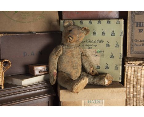 Rochford - a Farnell 1920s Teddy Bear,   with blonde mohair, black boot button eye, pronounced muzzle, remains of black stitc