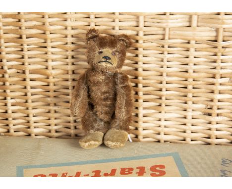 Little Hamlin - a miniature Steiff Teddy Baby probably 1930s, with brown mohair, brown and black glass eyes, inset velvet muz