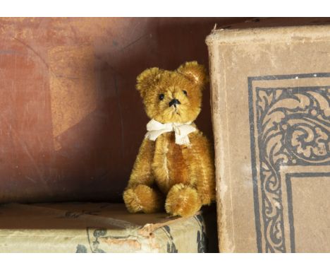 Whitburn - a post-war Schuco miniature Teddy Bear, with light brown mohair, black metal pin eyes, black stitched nose and mou