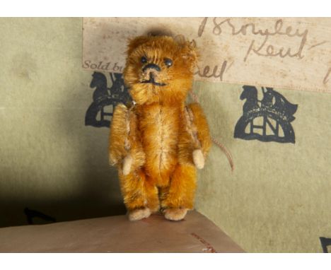 Abergele - a miniature Schuco Teddy Bear 1920s, with golden mohair, black pin eyes, black stitched nose and mouth, metal fram