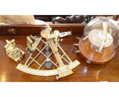 Brass sextant, and a Griffin & Tatlock Ltd compass under glass dome