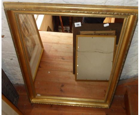Gilt-framed wall mirror