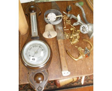 Servant's doorbell, a machete, a barometer, some brass door furniture and a mincer!