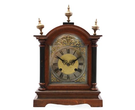 Table clock in walnut case with metal and brass dial, 38 cm high